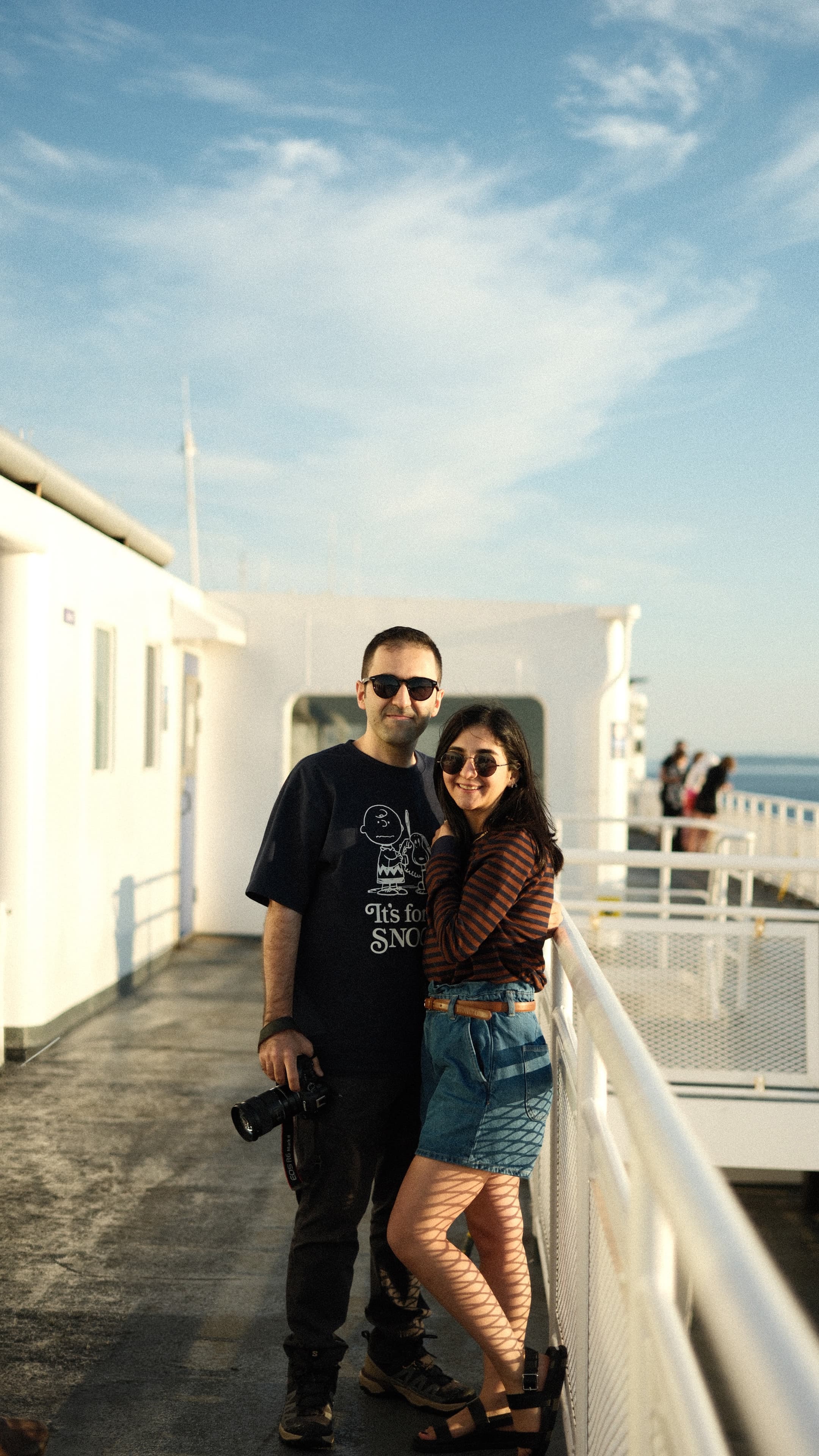 The two of us together on a ferry deck, camera in hand