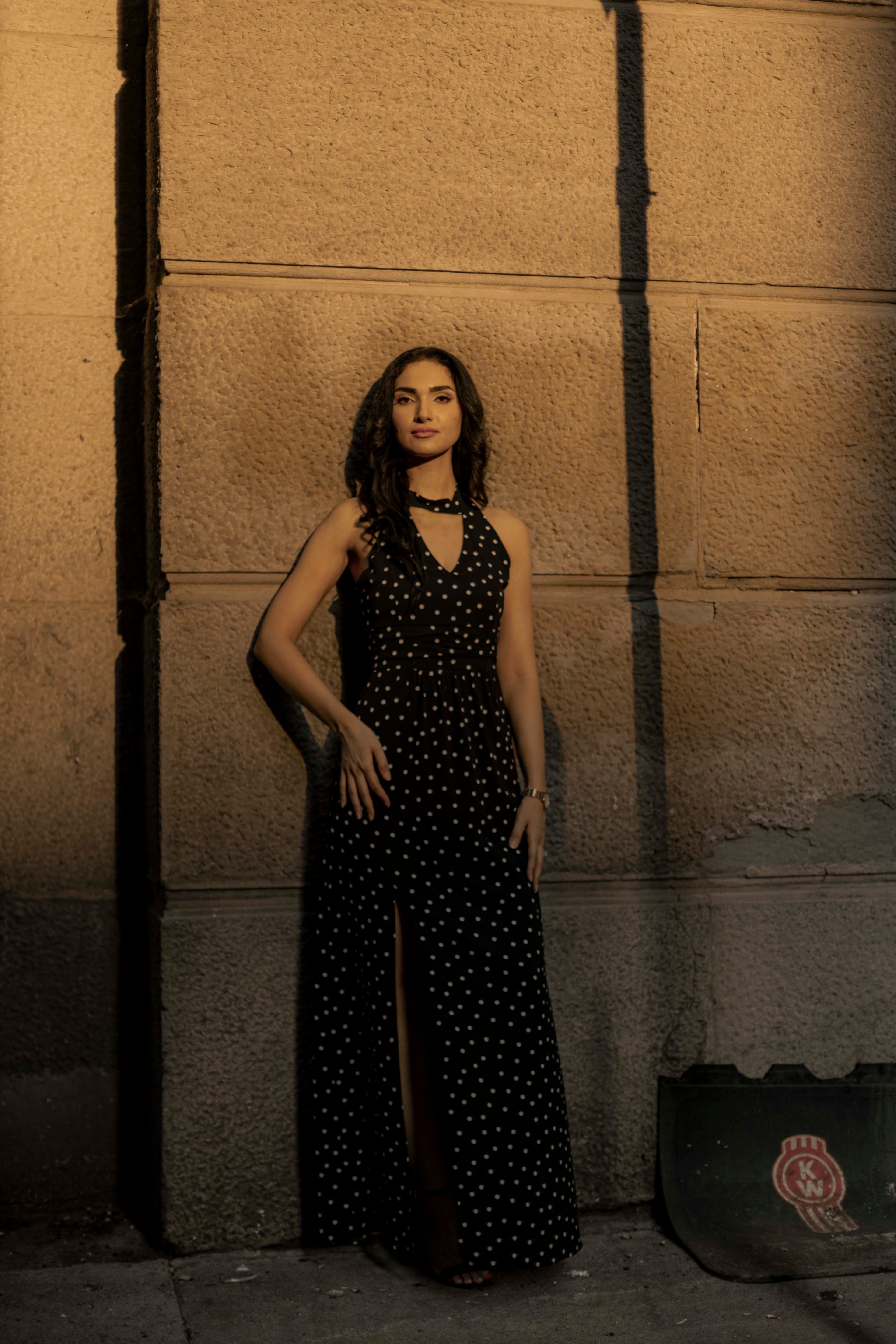 Portrait against a sunlit ochre wall