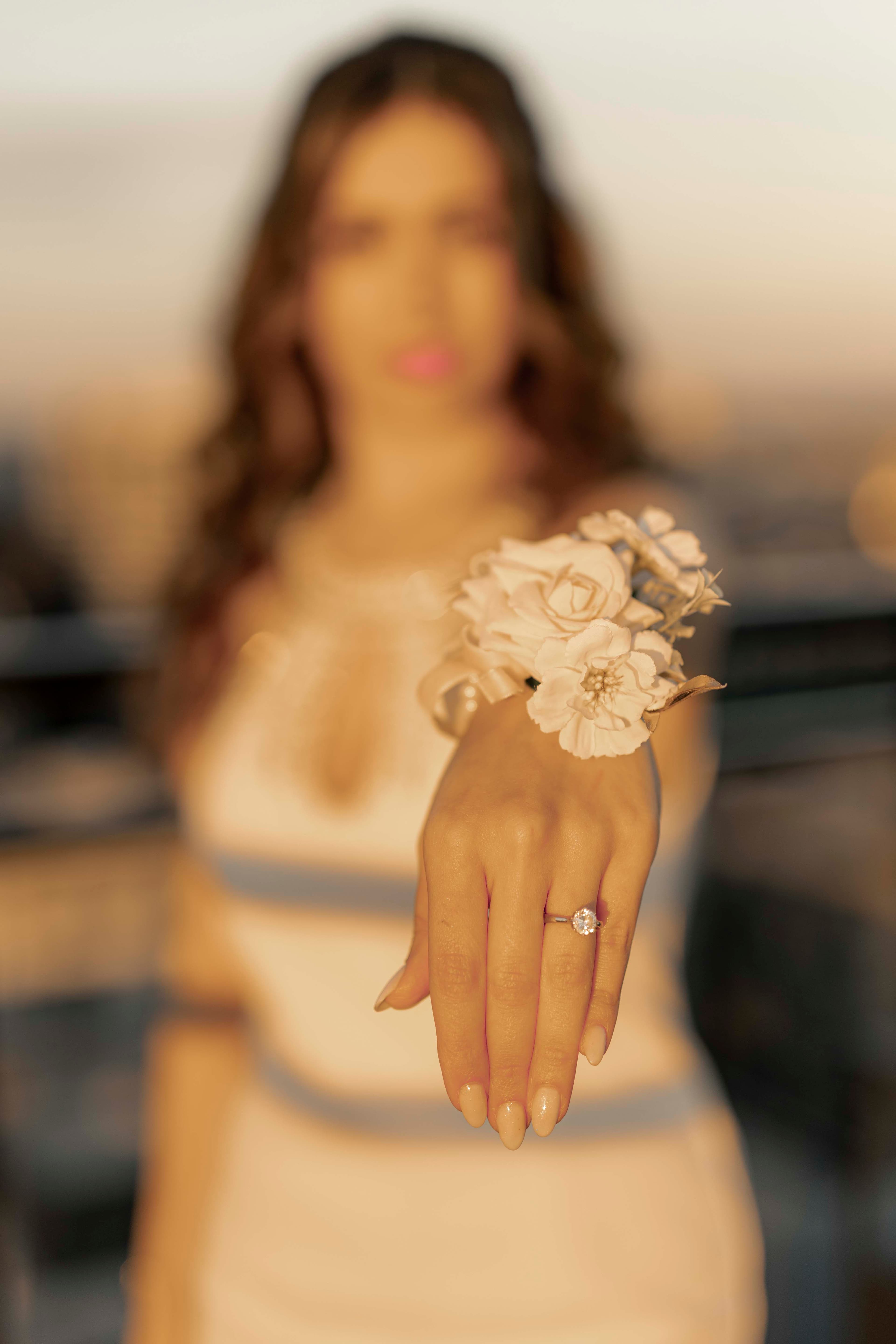 A ring and corsage, caught in soft focus